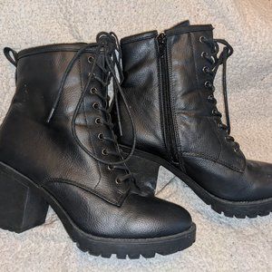 Black zip up heeled booties